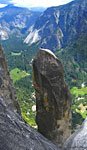 After climbing to Yosemite Point, I clambered around the cliff to shoot this climber atop Lost Arrow Spire. Don't know if you can tell, but it's a long way down!