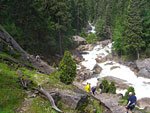 Hikers climb the long series of steps into the misty spray of Vernal Falls