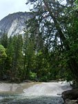 The Merced rushes down a waterslide into the Emerald Pool
