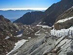 The cables traverse a notoriously icy spot above a looming dropoff. View east to Trail Camp and the valley up