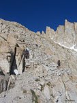 Hikers on a steep section of the 97 switchbacks