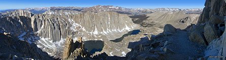  View north (R) and west (L) to the Hitchcock Lakes below 13184 ft. Mt. Hitchcock. Behind them in the distant center are the peaks of the Kaweah Range and the Great Western Divide. The John Muir Trail follows the wide valley at right and turns north to Forester Pass.