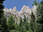 Big peaks scrape the sky on both sides of the canyon up