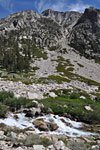 Bubbs Creek trail follows rushing water beneath towering peaks
