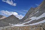 Even in late summer, there's a bank of snow and ice to cross, in places waist deep if you posthole in the wrong spot. 