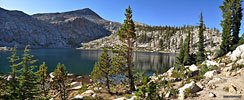After a long descent and then another climb up a spur trail to a high plateau, Rutherford Lake sparkles in the Sierra afternoon