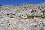 Midway up, the entire terrain consists of a unique "paved camouflage" pattern 
