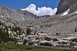 The JMT drops west and the jagged peaks of the Whitney Range slowly disappear