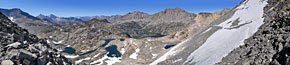 180 degree view north from atop Glen Pass. The JMT (right) traverses several icy snow fields on the switchbacks down.