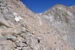 A group of backpackers descends the south side of Mather Pass (center)