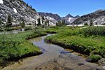 The JMT turns due west for several miles following Palisades Creek through Deer Meadow