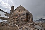 Muir Hut, just north of Muir Pass, built by the Sierra Club in the 1930's. Inside are wood bunkbeds, a stove and emergency supplies and knickknacks left by hikers