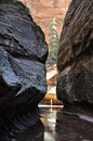 The lower canyon walls begin to take on a distinctive tubular shape.