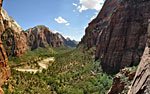 After some tricky maneuvering, we land on a platform 400 feet up with this sweeping view. Then come long moments strategizing our drop to a tiny exposed ledge halfway down that has room only for 3 of us.