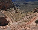 The temperature at the river is regularly 10-15 degrees hotter than the rim. As the sun rises and the trail descends, you'll feel the heat build. The switchbacks below O'neill Butte.