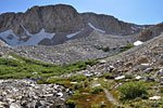 After an exhausting climb over sharp boulders, there are a series of rugged plateaus to ascend.