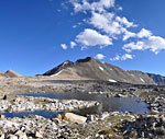 Clear blue tarns dot the rugged landscape atop Taboose Pass.