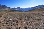In the distance you can already see Bench Lake lying high on a plateau to the west. Towering above is 12,958 ft. Arrow Peak.