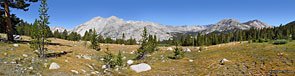 After crossing the John Muir Trail and starting up the Bench Lake trail, this view north of the ridgeline that holds Mather Pass (distant center).