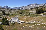 The meadowy pond-filled bowl below the pass is one of the highlights of the hike.