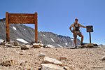 The wooden National Park Service sign atop Taboose Pass has seen better days but the metal one has held up well.