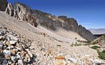 The trail here is linear piles of jagged stones.