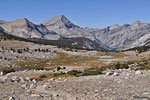 Next morning, the view west on the other side of the pass.To the left is Bench Lake. To the right is the trail to Cartridge Pass.