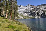 The highest point on the ridgeline above the lake is 12,719 ft. Marion Peak