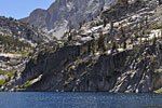 Rugged palisades drop into the west side of the lake