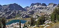 High on the western ridge, the cross-country route to Iceberg & Cecile lakes in the center
