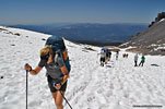 It's soon very hot. After 3 miles, we get off the dusty trail & switch to the snow route to cool off. Others follow