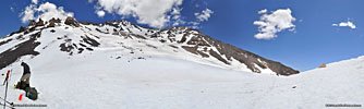 Helen Lake is a seriously tough climb and its only half way to the top. We're all exhausted! One of the guys bows out of tomorrows climb & will wait here for our return. After a welcome break, we gather on a steep slope to practice roped-climbing, self-arrest with ice axe and glissading.