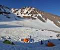 We'll set out up this huge bowl by headlamp at 2am in freezing temperature, roped together in 3 groups of 3. All the snow melting in the midday sun will have turned to ice overnight