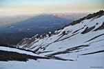 Shasta's peak shadow appears over the western landscape