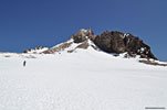 At the top of Misery Hill, we see the actual summit for the first time, across a big snow field. It's still another significant climb
