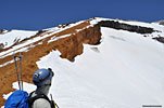 You can see a solo climber (left of top ctr.) making his way down the snowfield above Red Banks