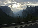 7:15 am. Yosemite valley looking west from Wawona Tunnel overlook. Half Dome is directly above tree in center.
